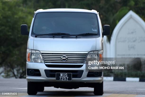 An immigration vehicle carrying Vietnamese national Doan Thi Huong, who was accused of murdering Kim Jong Nam, the half-brother of North Korean...