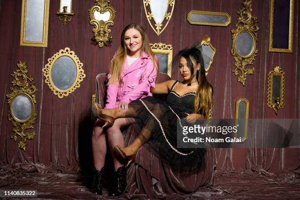 Allie Bennicas and Gabi DeMartino pose at Beautycon Festival New York 2019 at Jacob Javits Center on April 06, 2019 in New York City.
