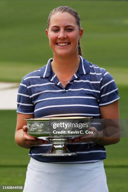 Jennifer Kupcho of the United States celebrates with the trophy after winning the Augusta National Women's Amateur at Augusta National Golf Club on...