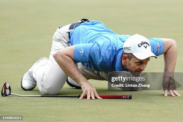 Stuart Manley of Wales lines up a putt on the 14th hole during the day two of the 2019 Volvo China Open at Genzon Golf Club on May 3, 2019 in...