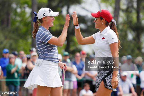Maria Fassi of Mexico and Jennifer Kupcho of the United States react on the 18th green during the final round of the Augusta National Women's Amateur...