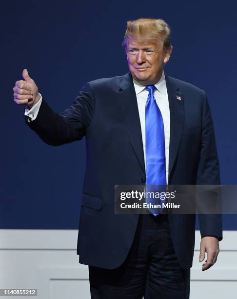 President Donald Trump gestures as he arrives at the Republican Jewish Coalition's annual leadership meeting at The Venetian Las Vegas on April 6,...