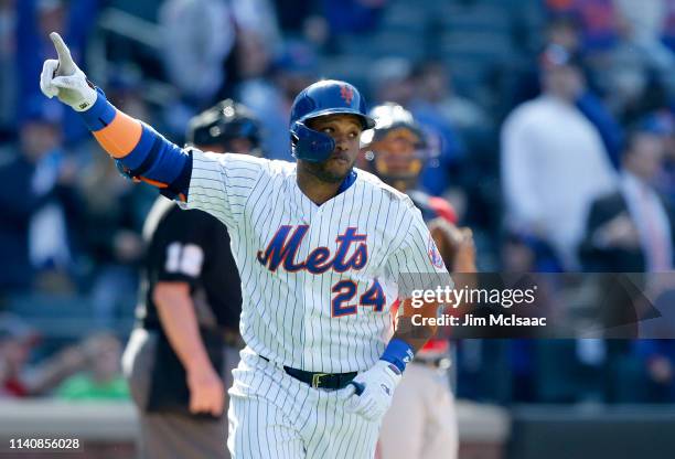 Robinson Cano of the New York Mets celebrates his eighth inning home run against the Washington Nationals at Citi Field on April 06, 2019 in the...