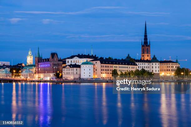 skyline at sunset in stockholm, sweden - stockholm cityscape stock pictures, royalty-free photos & images