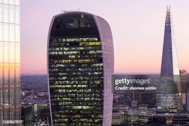 modern london architectures illuminated at dusk - 20 fenchurch street stock pictures, royalty-free photos & images