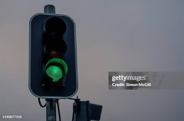 traffic light showing green go signal - road signal stock pictures, royalty-free photos & images