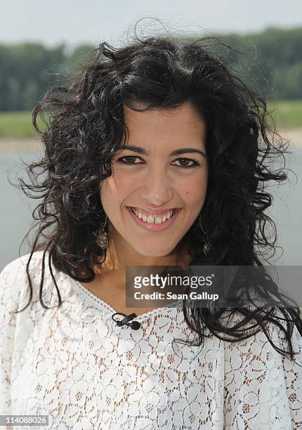Singer Lucia Perez of Spain poses for a photograph while sailing on a ship on the Rhine River during the Eurovision Song Contest 2011 on May 11, 2011...