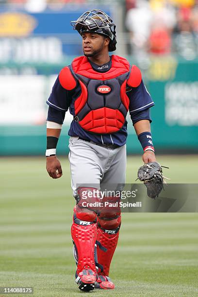 Catcher Carlos Santana of the Cleveland Indians walks toward the dugout during the game between the Cleveland Indians and the Los Angeles Angels of...