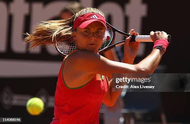 Daniela Hantuchova of Slovakia plays a backhand return during her second round match against Romina Oprandi of Italy during day four of the...