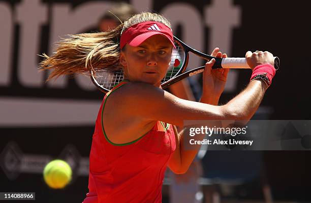 Daniela Hantuchova of Slovakia plays a backhand return during her second round match against Romina Oprandi of Italy during day four of the...