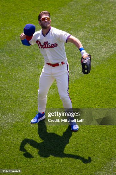 Bryce Harper of the Philadelphia Phillies salutes the crowd prior to the game against the Minnesota Twins at Citizens Bank Park on April 6, 2019 in...