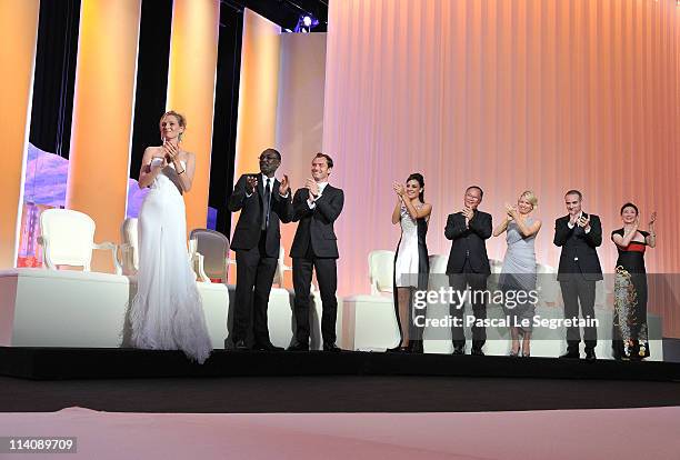 Jury members Uma Thurman, Mahamat-Saleh Haroun, Jude Law, Martina Gusman, Johnnie To, Linn Ullmann, Olivier Assayas and Nansun Shi onstage at the...