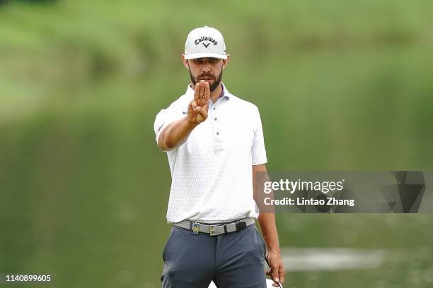 Erik Van Rooyen of South Africa lines up a putt on the 14th hole during the day two of the 2019 Volvo China Open at Genzon Golf Club on May 3, 2019...
