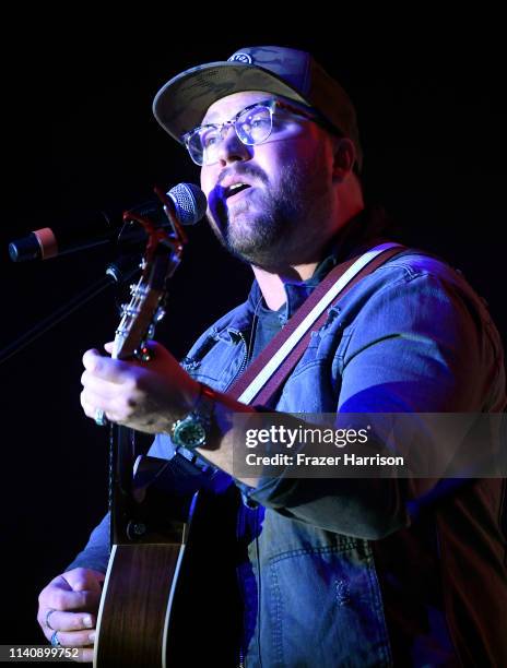 Mitchell Tenpenny performs onstage at ACM Lifting Lives®: Decades on April 06, 2019 in Las Vegas, Nevada.