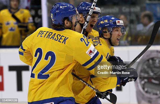 Martin Thornberg of Sweden celebrates after he scores his team's opening goal during the IIHF World Championship quarter final match between Sweden...