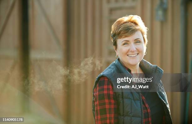 life is beautiful on a farm - female farmer stock pictures, royalty-free photos & images