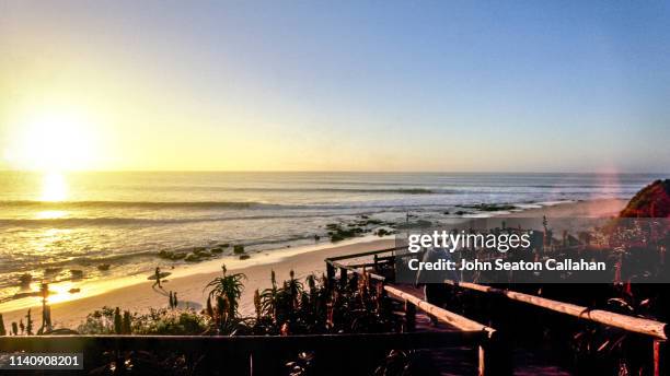 south africa, sunrise surfing at jeffrey's bay - jeffreys bay stock pictures, royalty-free photos & images