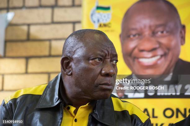 South African President and president of the ruling African National Congress , Cyril Ramaphosa, listens to questions prior to addressing the crowd...