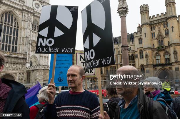 Anti-nuclear weapons activists from Campaign for Nuclear Disarmament stage a protest outside Westminster Abbey on 03 May, 2019 in London, England....