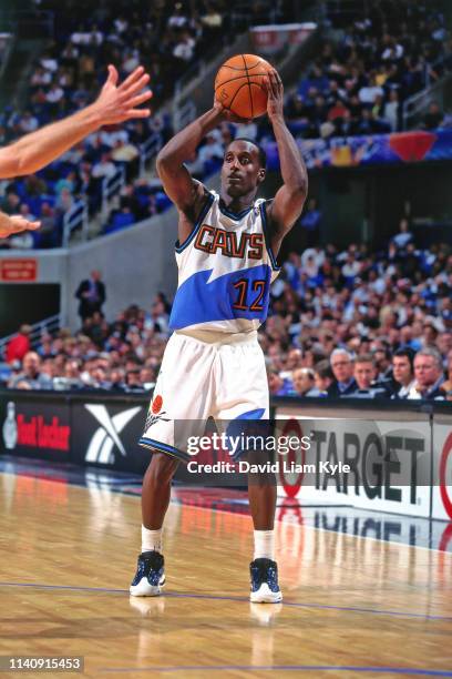 Brevin Knight of the Cleveland Cavaliers looks to pass the ball against the Chicago Bulls on April 9, 1998 at the Gund Arena in Cleveland, Ohio. NOTE...