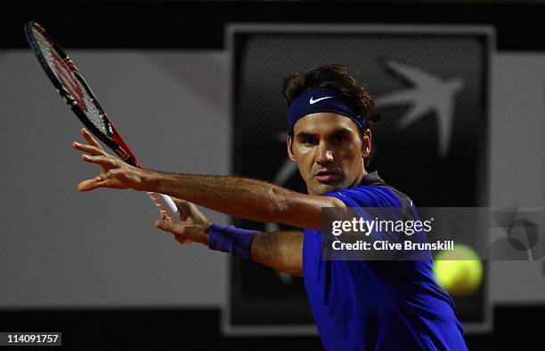 Roger Federer of Switzerland plays a forehand during his second round match against Jo-Wilfried Tsonga of France during day four of the...