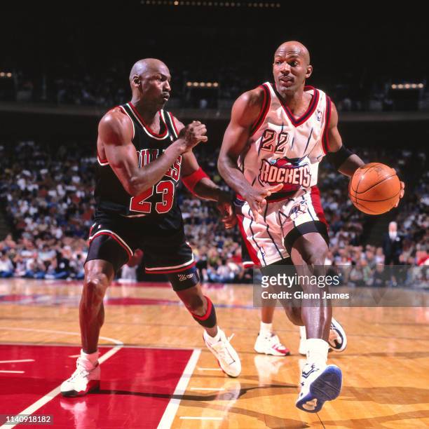 Clyde Drexler of the Houston Rockets handles the ball against the Chicago Bulls on April 5, 1998 at the The Summit in Houston, TX. NOTE TO USER: User...