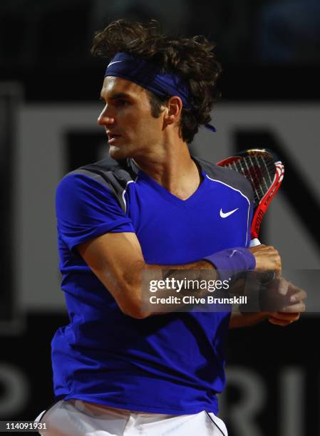 Roger Federer of Switzerland in action during his second round match against Jo-Wilfried Tsonga of France during day four of the Internazoinali BNL...