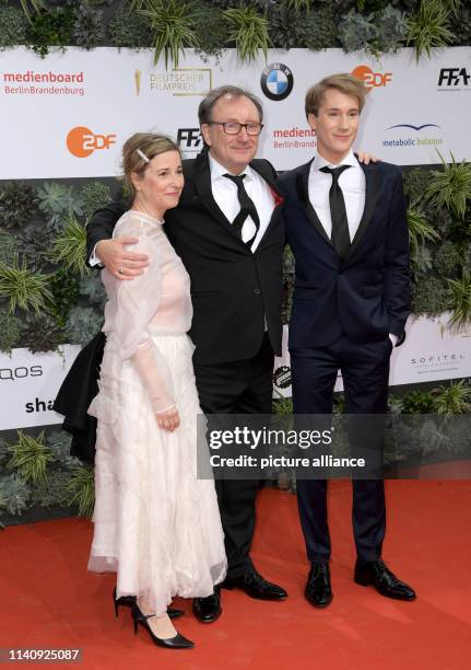 The actor Rainer Bock , his wife Christina Scholz and his son Moritz Bock attend the 69th German Film Award "Lola". Photo: Jörg Carstensen/dpa