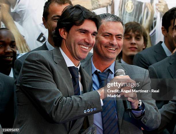 Head coach Jose Mourinho and his assitant Aitor Karanka of Real Madrid smile during the celebration of the recent win of the Copa del Rey title at...