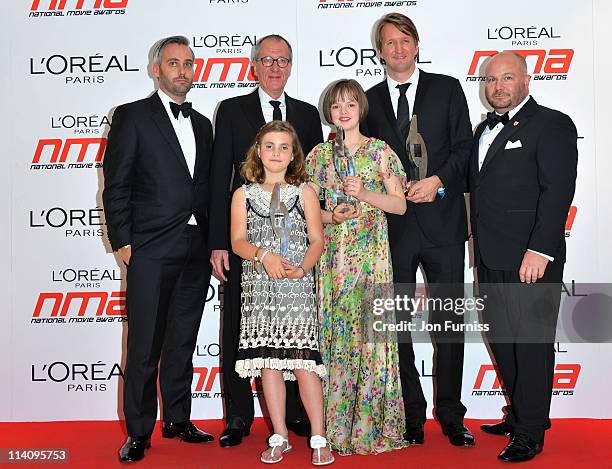 Cast and crew from The Kings Speech including Geoffery Rush, Tom Hooper, Freya Wilson and Ramona Marquez pose in the press room at the L'Oreal...