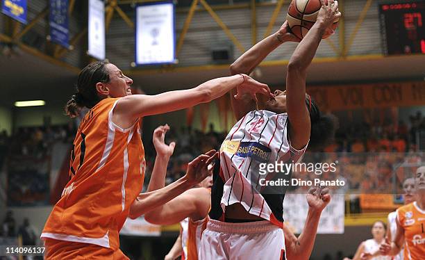 Laura Macchi of Famila Schio competes with Kathy Wambe of Cras Taranto during game 5 of the Lega Basket Femminile Serie A1 final between Famila Schio...