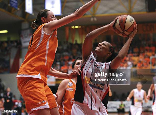 Laura Macchi of Famila Schio competes with Kathy Wambe of Cras Taranto during game 5 of the Lega Basket Femminile Serie A1 final between Famila Schio...