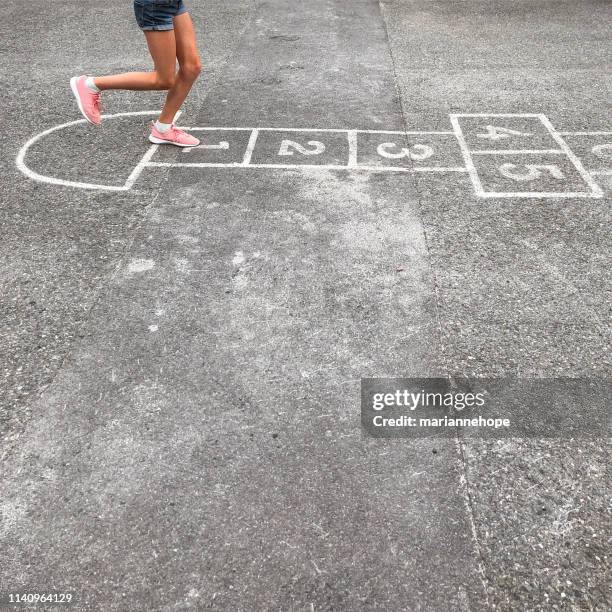 girl playing hopscotch, baerums verk, baerum, akershus, norway - hopscotch stock pictures, royalty-free photos & images