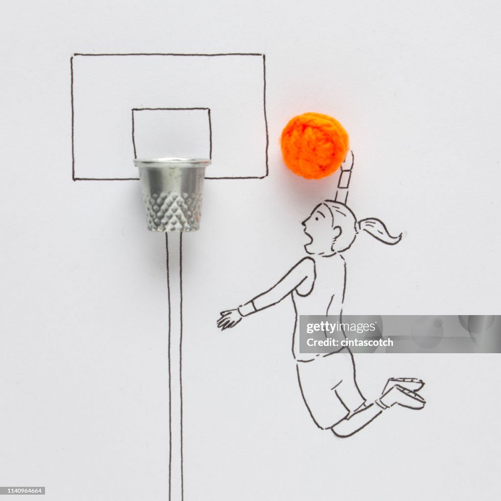 Conceptual woman playing basketball