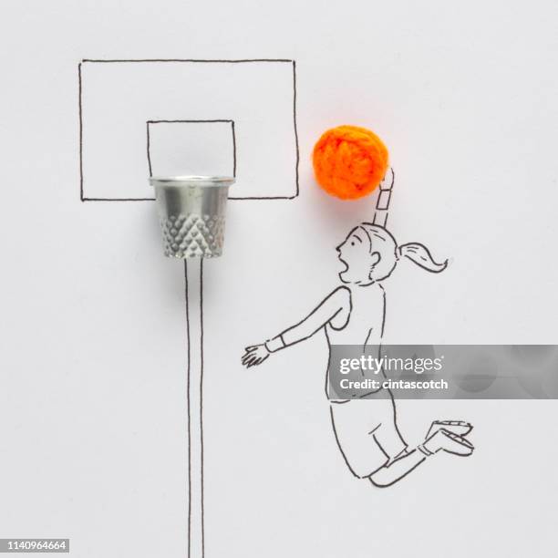 conceptual woman playing basketball - thimble stock pictures, royalty-free photos & images