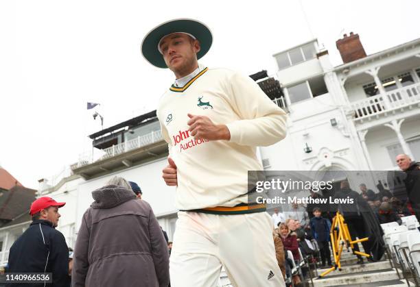 Stuart Broad of Nottinghamshire walks out to field during day three of the Specsavers County Championship Division One match between Nottinghamshire...
