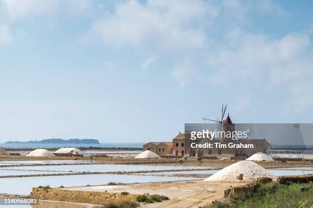 Ettore and Infersa windmill and salt pans of Trapani at Marsala, Sicily, Italy..