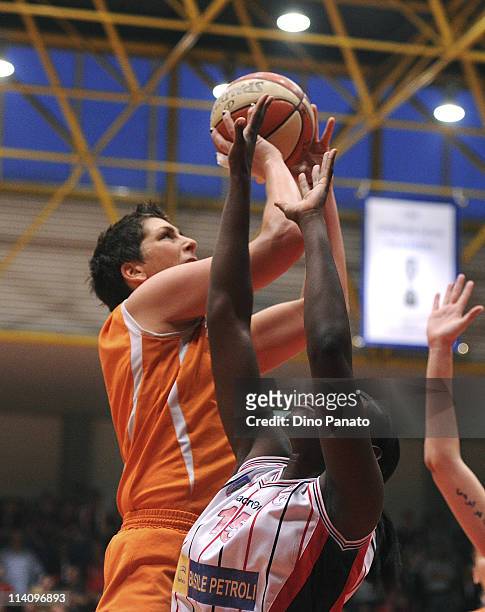 Janel McCarville of Famila Schio competes with Sophia Young of Cras Taranto during game 5 of the Lega Basket Femminile Serie A1 final between Famila...