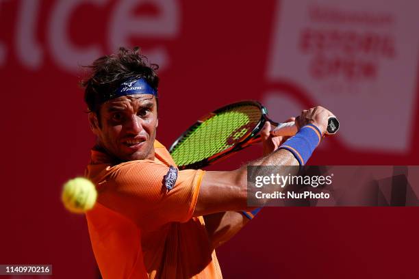 Malek Jaziri from Tunisia returns a ball to David Goffin from Belgium during their Millennium Estoril Open ATP 250 Singles final tennis match, in...