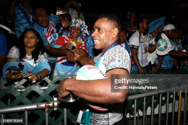 Livai Ikanikoda of Fiji celebrates with fans after beating France in the final on day three of the Cathay Pacific/HSBC Hong Kong Sevens at the Hong...