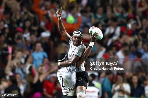 Vilimoni Botitu of Fiji celebrates after beating France in the final on day three of the Cathay Pacific/HSBC Hong Kong Sevens at the Hong Kong...