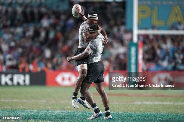 Vilimoni Botitu and Josua Vakurunabili of Fiji celebrate after the Fiji v France HSBC Rugby Sevens Final on day three of the Cathay Pacific/HSBC Hong...
