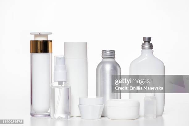 cosmetic products on white background - toiletries foto e immagini stock