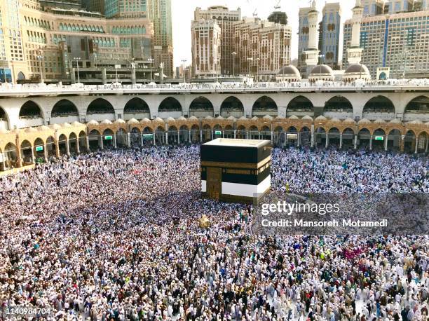 pilgrims in al-haram mosque - mecca stock pictures, royalty-free photos & images