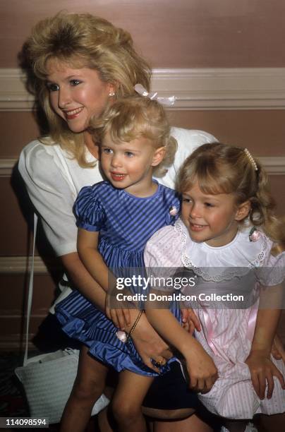 Kathy, Nicky, and Paris Hilton pose for a portrait in c.1985 in Los Angeles, California.