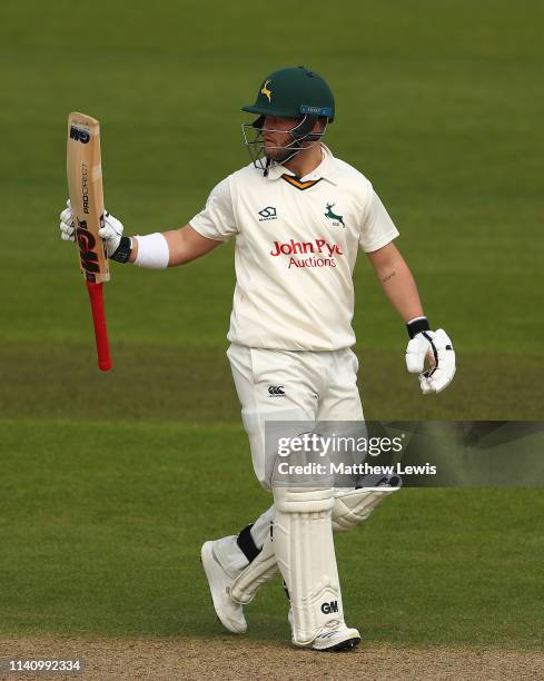 Ben Duckett of Nottinghamshire celebrates his half century during day three of the Specsavers County Championship Division One match between...