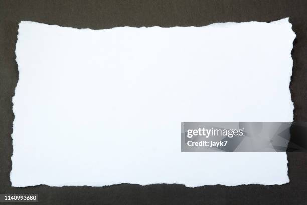 white torn paper - at the edge of stock pictures, royalty-free photos & images