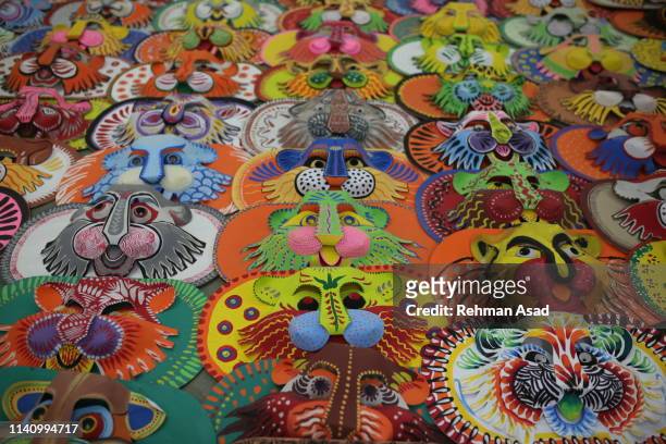 bangladeshi traditional mask - poila baishakh stock pictures, royalty-free photos & images