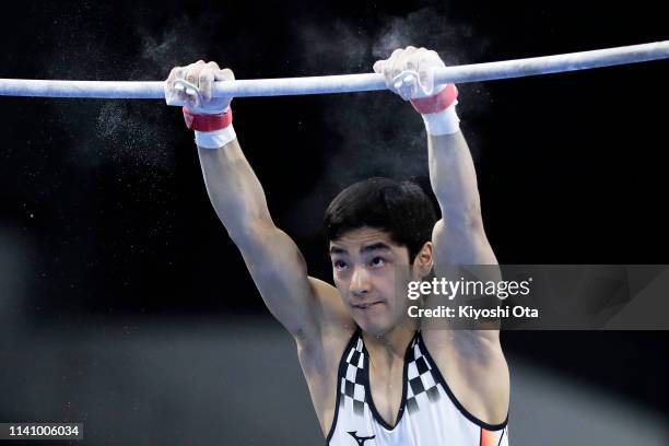 Kenzo Shirai of Japan competes in the Men's Horizontal Bar during the FIG Artistic Gymnastics All-Around World Cup Tokyo at Musashino Forest Sport...