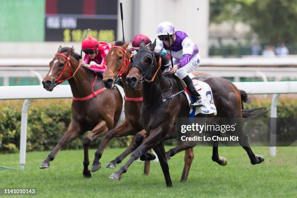 Jockey Chad Schofield riding Rattan wins the Race 3 The Sprint Cup at Sha Tin Racecourse on April 7, 2019 in Hong Kong.